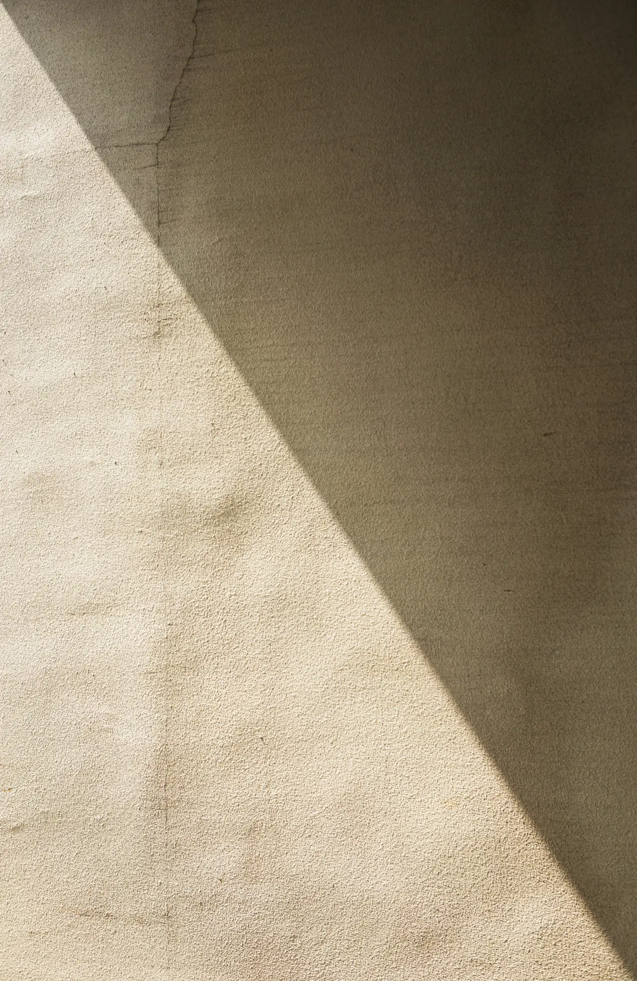 Warm board-marked concrete wall