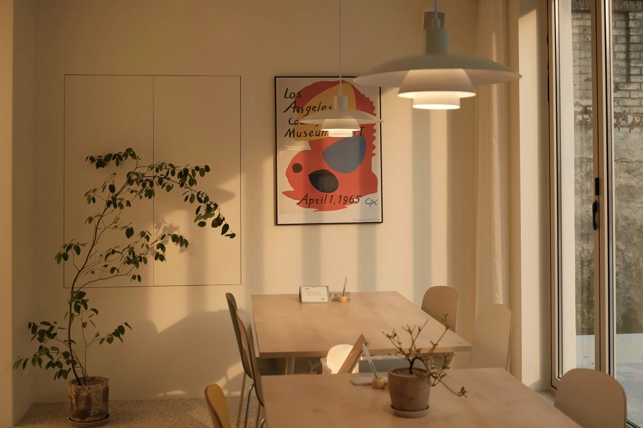 A long wooden dining table and chairs